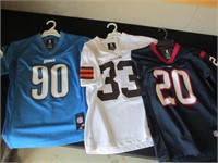 three youth NFL jerseys