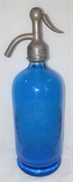 Vintage blue seltzer bottle.