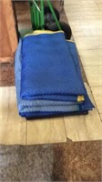 Five blue packing blankets