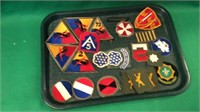 Tray of military patches