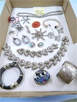 Assorted Silvertone Jewelry with a couple Sterling
