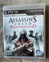 PS3 assassins creed brotherhood w/ book & case