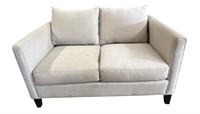 White Upholstered Two Seat Couch