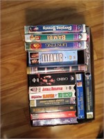 Box of VHS movies some Disney