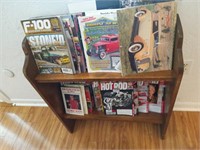 Wood magazine rack with hot rod magazines and
