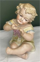 Vintage Bisque Porcelain Piano Baby Girl Figurine