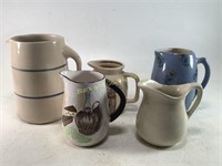 Five Ceramic Pitchers