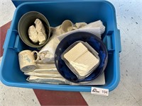 Tote of coffee cups, plastic bowls