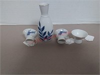 Vintage Japanese 4 Piece Sake 
Set. White and