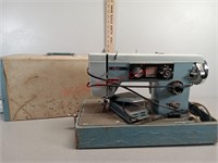Dressmaker sewing machine with case
