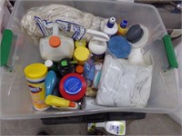 Tote of cleaning supplies