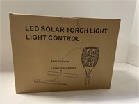 New in box 4 pack LED Solar Torch Light
