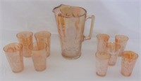 Marigold glass pitcher w/ 9 glasses.