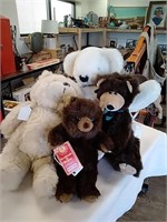 Group of four stuffed teddy bears