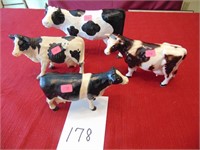 4 Holstein Cow figurines