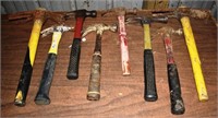 Collection of 6 hammers and two digging tools; as