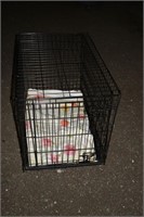 Approximately 2'x3' metal pet crate with plastic t