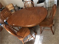 Oak pedestal table and 4 arrowback chairs