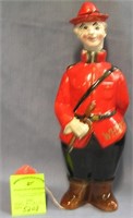Figural Canadian mounted policeman liquor decanter