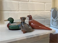 Collection of clay and ceramic birds