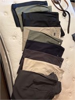 10 pair of dress pants. Mostly dockers brand.