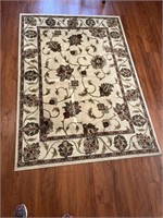 Area rug. Dimensions 89 x 62.