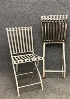 Two Vintage Folding Iron Chairs