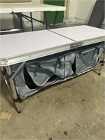Small folding table with storage