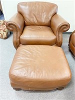 ROBINSON AND ROBINSON BROWN LEATHER ARMCHAIR W/