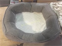 Used dog bed, throw blankets, leather scraps,