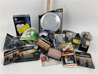 Assorted light bulbs and batteries, includes