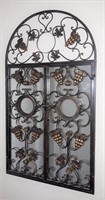 Wrought iron framed mirror.