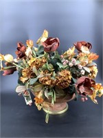 Artificial floral arrangements with urn