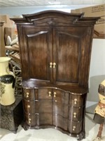 Fanciful old world oversized armoire by Bernhardt