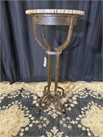 Oversized iron pedestal with marble top
