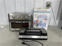 Snow cone maker. Vacuum sealer and toaster