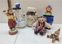 A collection of clowns and doctor in a glass
