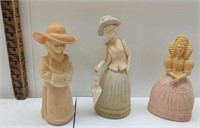 A collection of three lady Avon decanters