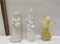 A collection of three ladies & girl Avon decanters