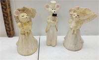 A collection of three mouse Avon decanter