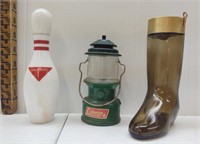 A collection of three men themed Avon decanters