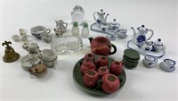 Assortment of miniature tea sets, glass owl paper