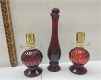 A collection of three beautiful Avon bottles