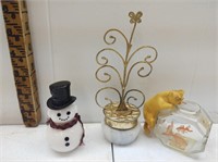 A collection of three cute Avon decanters