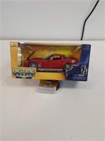 1.  2006 CHEVY CORVETTE Z06 new in box. 1/24