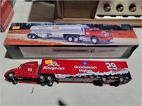 2 toy trucks