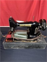 Sterling vintage, sewing machine in case