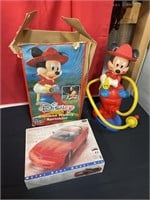 Mickey Mouse fireman sprinkler in 1997 Chevrolet
