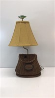 Fishing basket table lamp. Stands 27’’ tall with