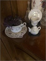 Cup and saucer w/ minitures